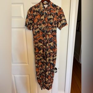 Chufy short sleeve jumpsuit with metallic thread detail. Size medium. Exc cond